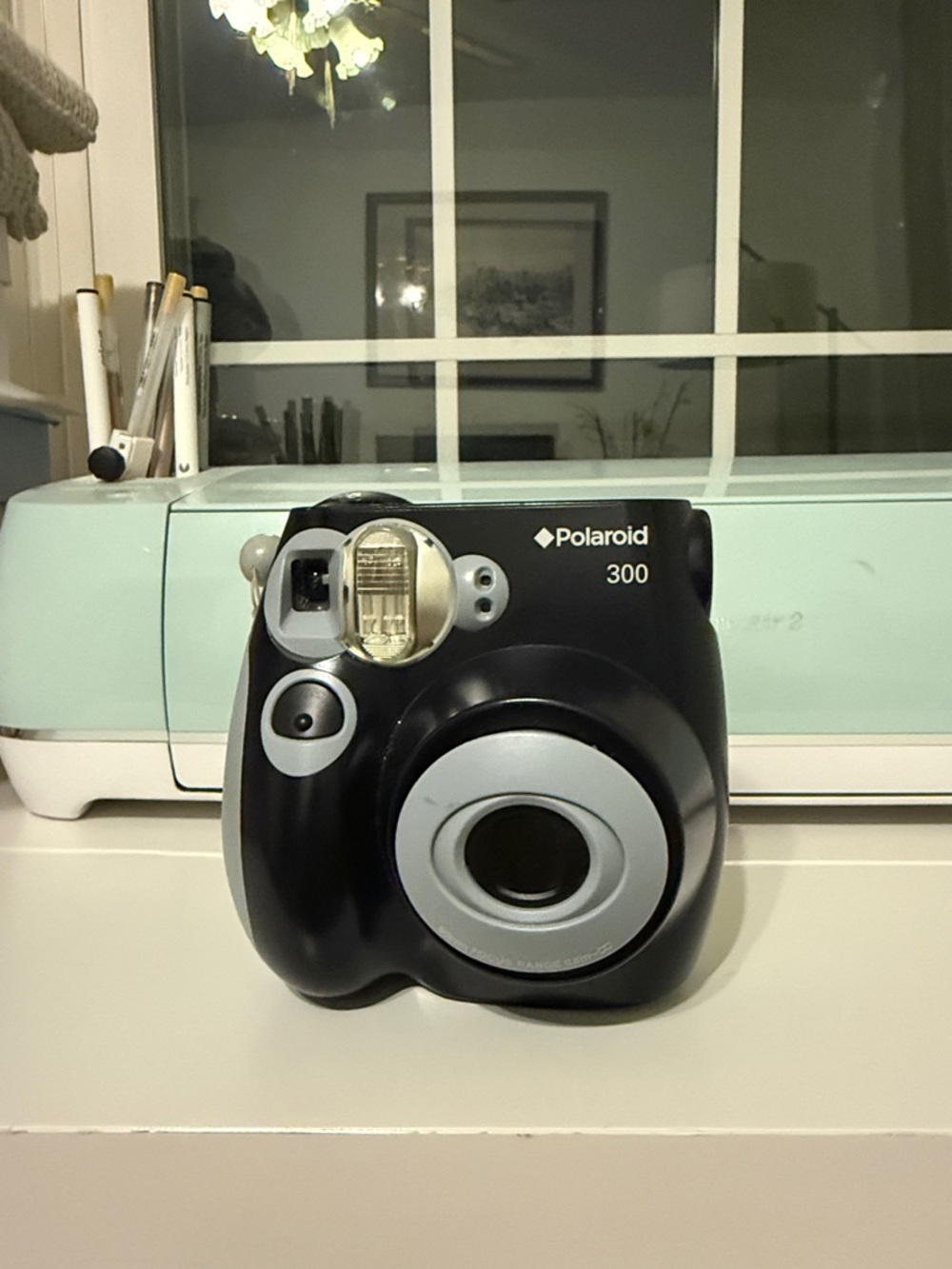Polaroid 300 Instant Camera in Black and Light Gray